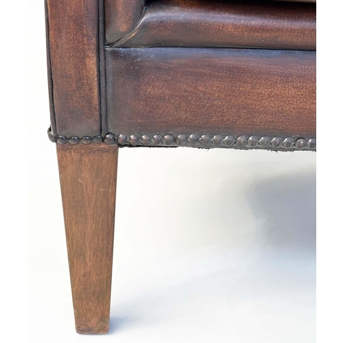 109 - LIBRARY ARMCHAIR, tub form mid brown natural leather upholstered with rounded back and arms and tape... 