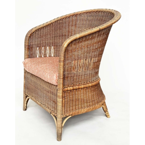 118 - CONSERVATORY ARMCHAIRS BY DRYAD, a pair, rattan and cane woven, with arched back and seat cushions, ... 