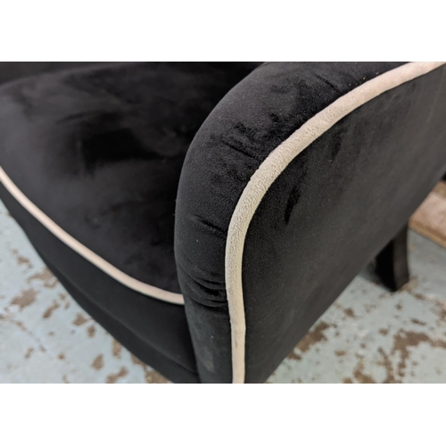 404 - WINGBACK ARMCHAIR, 82cm W, 1950s Italian style, black velvet upholstered, grey piping detail.