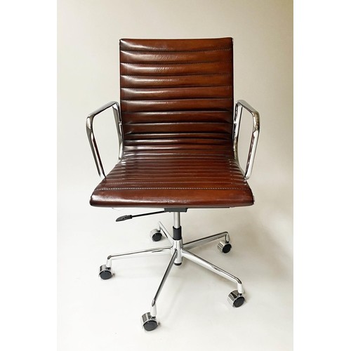 111 - REVOLVING DESK CHAIR, Charles and Ray Eames inspired with ribbed mid brown natural leather seat revo... 
