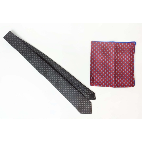 79 - GUCCI TIE, silk, with GG iconic pattern, 148cm x 7cm together with a pocket square/handkerchief, 45c... 