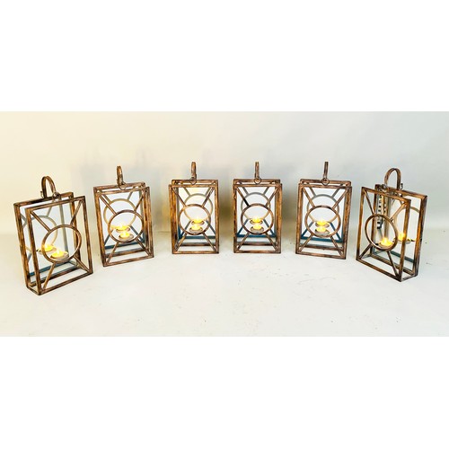 302 - WALL HANGING CANDLE LANTERNS, a set of six, Art Deco style, mirrored backs, 43cm x 22cm x 11cm. (6)