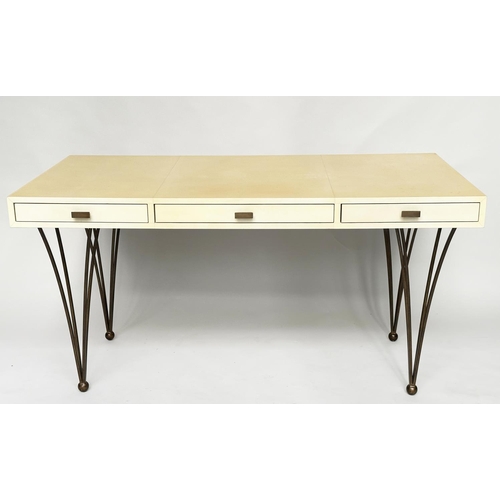 320 - JULIAN CHICHESTER RAVEL DESK, natural velum covered with three frieze drawers and bronze tapering su... 