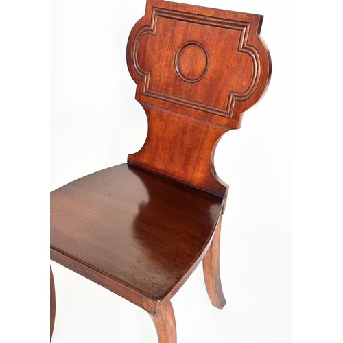 449 - HALL CHAIRS, a pair, Regency style mahogany with cartouche inset backs and sabre front supports, 44c... 