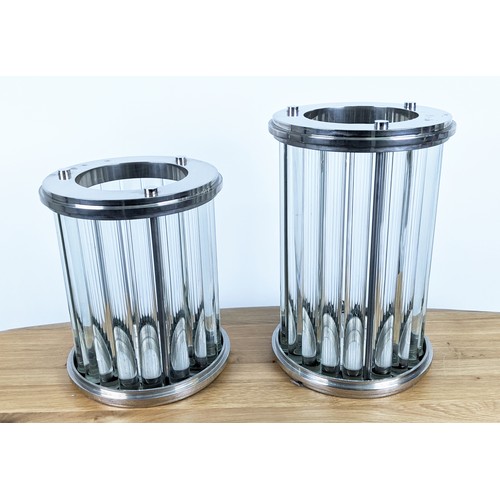 406 - STORM LANTERNS, a graduated pair, polished metal, with glass rods, 40.5cm x 26.5cm diam. at largest.... 