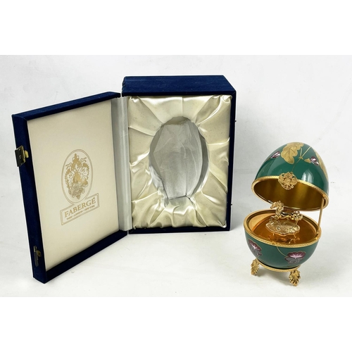 1 - MUSICAL FABERGE EGG, number thirteen, green and gilt ceramic with hinged lid enclosing gilt unicorn ... 