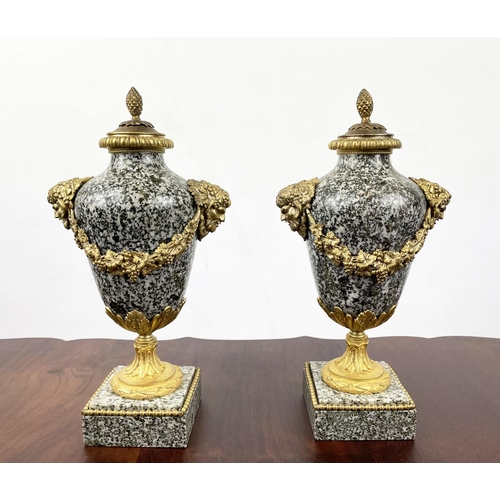 11 - CASSOULETTES, a pair, French Empire grey, having variagated marble ormolu satyr mask mounts and flor... 