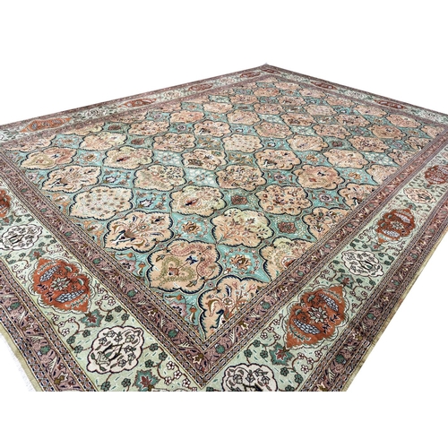 193 - A FINE UNUSUAL PERSIAN TABRIZ CARPET, 400cm x 293cm.