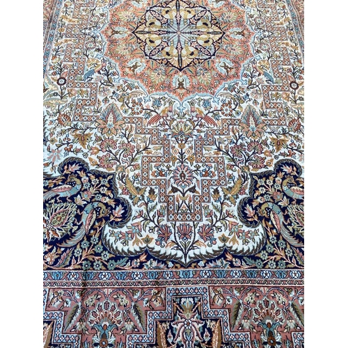 194 - FINE PURE SILK TEHRAN DESIGN CARPET, 295cm x 180cm.