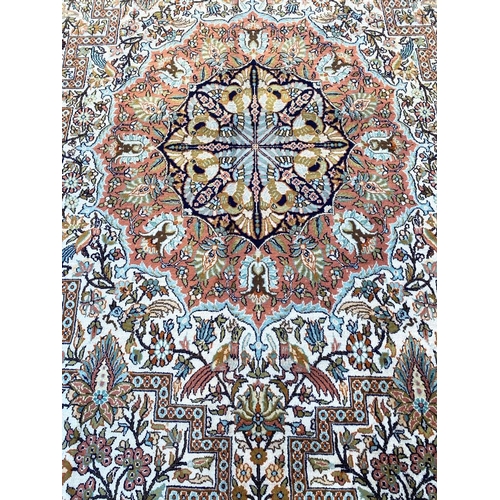 194 - FINE PURE SILK TEHRAN DESIGN CARPET, 295cm x 180cm.