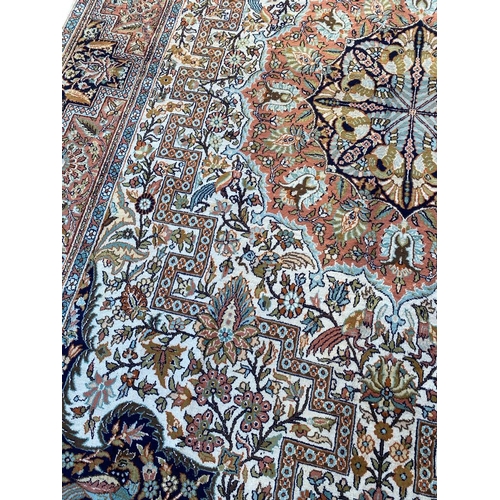 194 - FINE PURE SILK TEHRAN DESIGN CARPET, 295cm x 180cm.