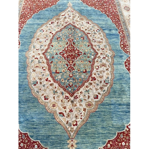 196 - FINE TABRIZ HAJI-JALLILY CARPET, 279cm x 189cm.