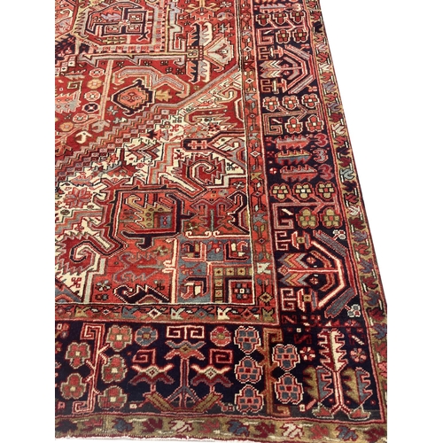 200 - PERSIAN HERIZ CARPET, 405cm x 300cm.