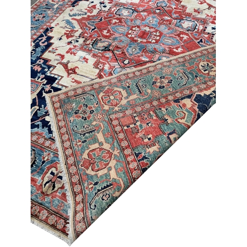 204 - FINE PERSIAN SERAPI DESIGN CARPET, 345cm x 275cm.