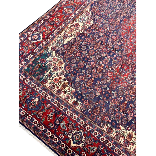 207 - FINE PERSIAN TABRIZ HERATI DESIGN CARPET, 315cm x 222cm.