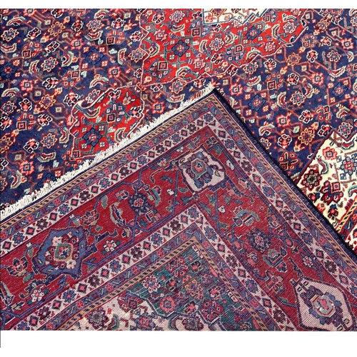 207 - FINE PERSIAN TABRIZ HERATI DESIGN CARPET, 315cm x 222cm.