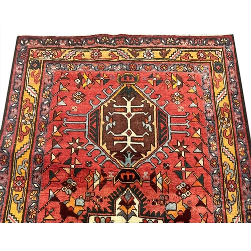 214 - PERSIAN HERIZ RUNNER, 350cm x 105cm.