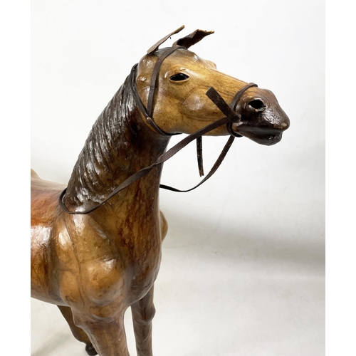 24 - MODEL STALLION HORSE, tanned leather clad, 98cm x 98cm.