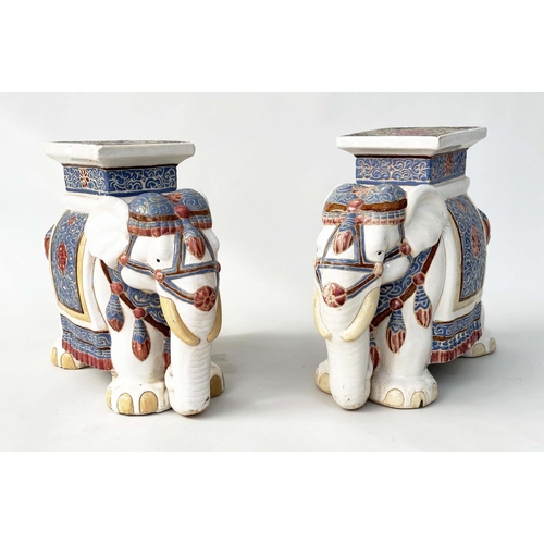 255 - ELEPHANT STOOLS, a pair, Chinese ceramic modelled as ceremonial elephants, 45cm H x 55cm W x 25cm D.... 