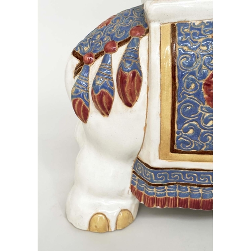 255 - ELEPHANT STOOLS, a pair, Chinese ceramic modelled as ceremonial elephants, 45cm H x 55cm W x 25cm D.... 