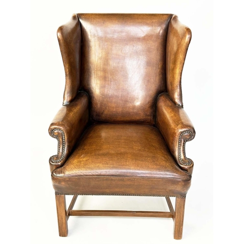 260 - WING ARMCHAIR, early George III design mahogany with brass studded naturally faded mid brown leather... 