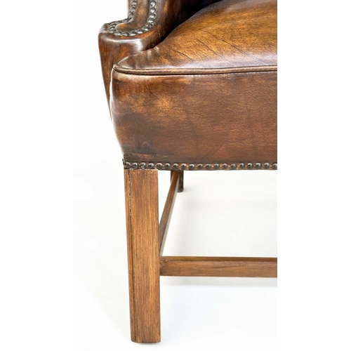 260 - WING ARMCHAIR, early George III design mahogany with brass studded naturally faded mid brown leather... 