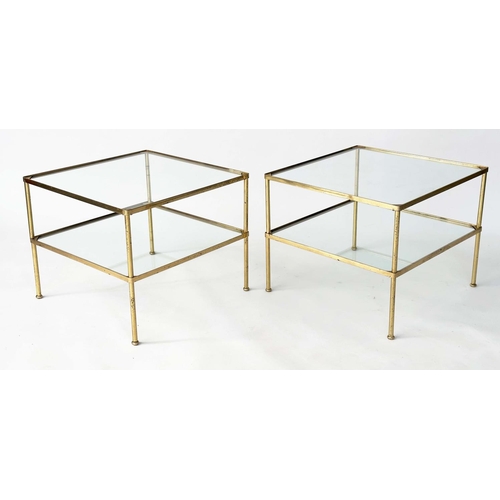 280 - LAMP TABLES, a pair, 1970s, gilt metal, square with two glazed tiers and capped tubular supports, 50... 