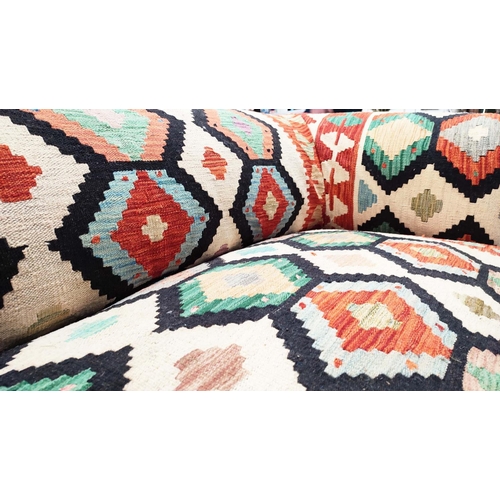 294 - KILIM SOFA, George Smith style, studded anatolian kilim upholstered with turned front supports and c... 