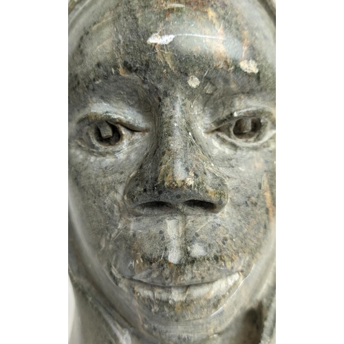 41 - OSCAR SANDE CARVED STONE HEAD, 20th century signed to bottom right, 24cm H.