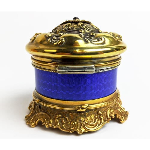 5 - A FABERGE SILVER GILT AND BLUE ENAMELLED CIRCULAR BOX, embossed lid set with ruby and diamonds, with... 