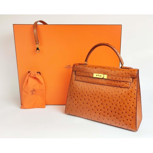 60 - HERMÈS KELLY SELLIER 32 OSTRICH, gold tone hardware, top handle, color matching leather lining, one ... 