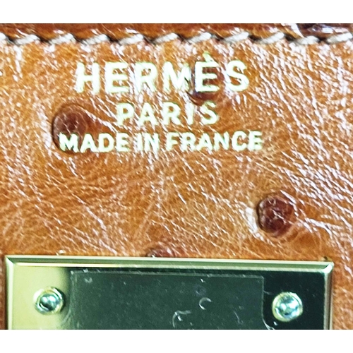 60 - HERMÈS KELLY SELLIER 32 OSTRICH, gold tone hardware, top handle, color matching leather lining, one ... 
