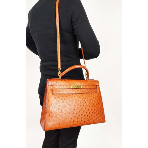 60 - HERMÈS KELLY SELLIER 32 OSTRICH, gold tone hardware, top handle, color matching leather lining, one ... 
