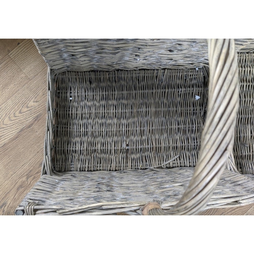 637 - PAOLO MOSCHINO SELECTION OF WILLOW BASKETS, a set of seven, differing, 73cm x 48cm x 43cm at largest... 