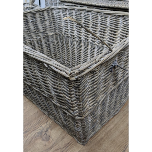 637 - PAOLO MOSCHINO SELECTION OF WILLOW BASKETS, a set of seven, differing, 73cm x 48cm x 43cm at largest... 