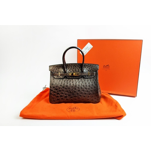67 - HERMÈS BIRKIN 30 OSTRICH, gold tone hardware, top handles, color matching leather lining, one zip po... 