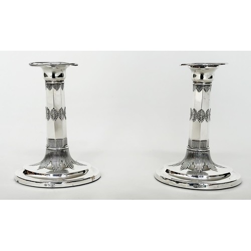 40A - SILVER CANDLESTICKS, a pair, Victorian facetted columns palmette and reed decoration, oval base, 17c... 