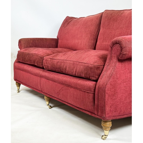 233 - SOFA, George Smith style upholstered in raspberry chenille, raised on turned front supports and bras... 