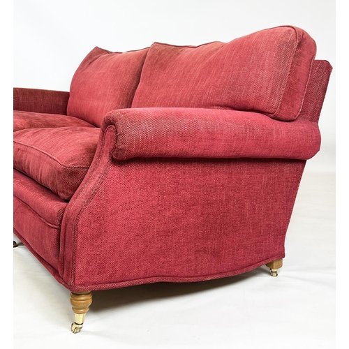 233 - SOFA, George Smith style upholstered in raspberry chenille, raised on turned front supports and bras... 