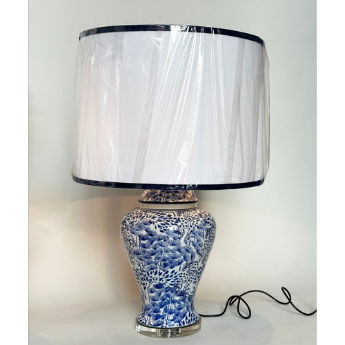 257 - TABLE LAMPS, a pair large Chinese blue and white ceramic of lidded vase form with lucite bases and s... 