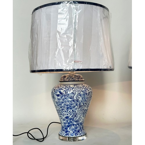 257 - TABLE LAMPS, a pair large Chinese blue and white ceramic of lidded vase form with lucite bases and s... 