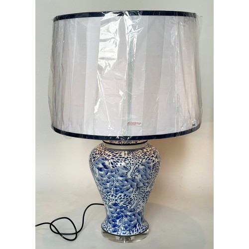 257 - TABLE LAMPS, a pair large Chinese blue and white ceramic of lidded vase form with lucite bases and s... 