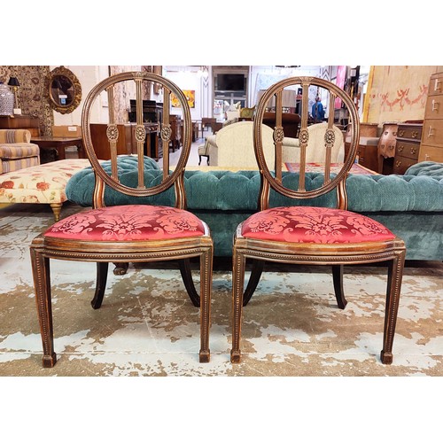 364 - A SET OF FOUR ROBERT ADAM STYLE MAHOGANY DINING CHAIRS, late 19th century oval backs vertical splats... 