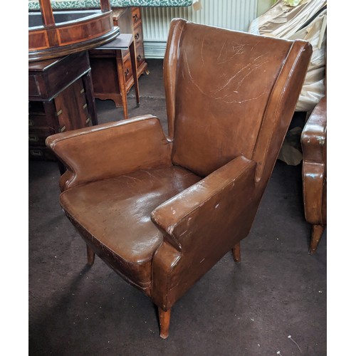 651 - ARMCHAIRS, a pair, tan leather, 88.5cm H x 68cm x 66cm. (2)