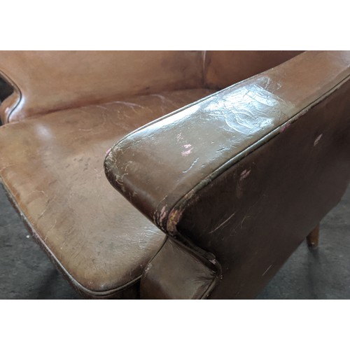 651 - ARMCHAIRS, a pair, tan leather, 88.5cm H x 68cm x 66cm. (2)