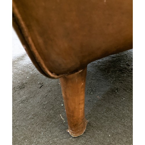 651 - ARMCHAIRS, a pair, tan leather, 88.5cm H x 68cm x 66cm. (2)