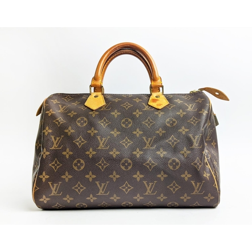 100 - LOUIS VUITTON SPEEDY BAG, made in USA, monogram coated canvas with leather trims and two top handles... 