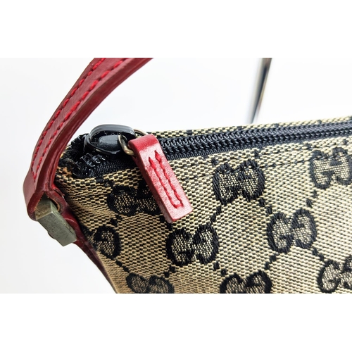 89 - GUCCI VINTAGE POCHETTE BAG, monogrammed canvas with red top leather handle and trims, top zippered c... 
