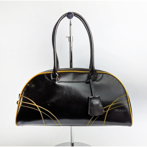 95 - PRADA VINTAGE BOWLING BAG, moro leather with two top leather handles, top zippered closure, contrast... 
