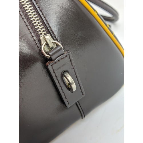 95 - PRADA VINTAGE BOWLING BAG, moro leather with two top leather handles, top zippered closure, contrast... 